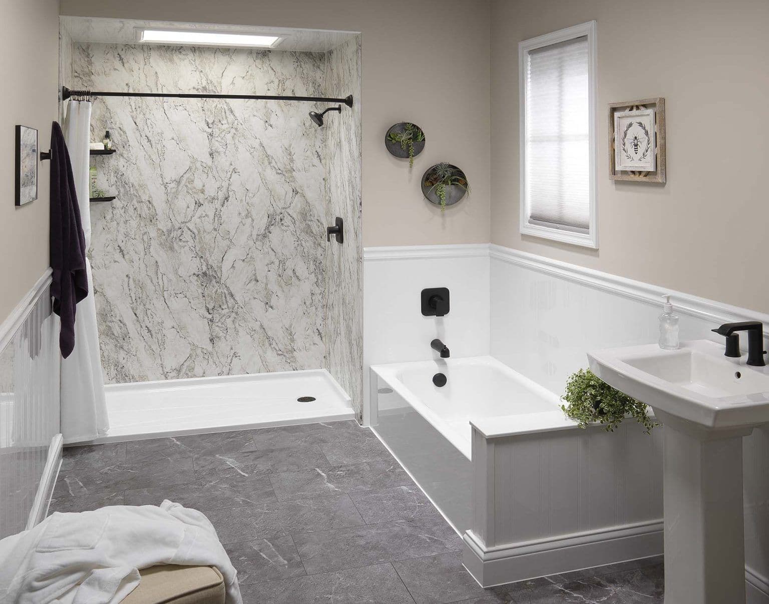 A newly-remodeled bathroom with a walk-in shower and full bathtub on the right.