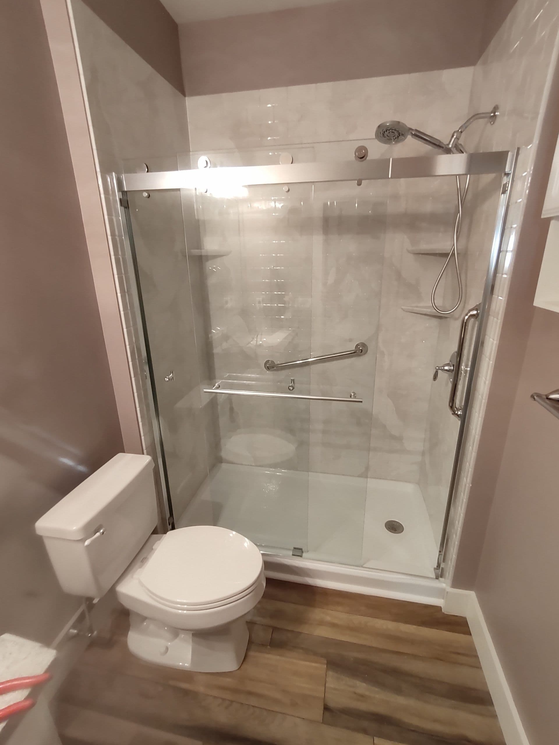 Before and after photos of a bathroom remodel.