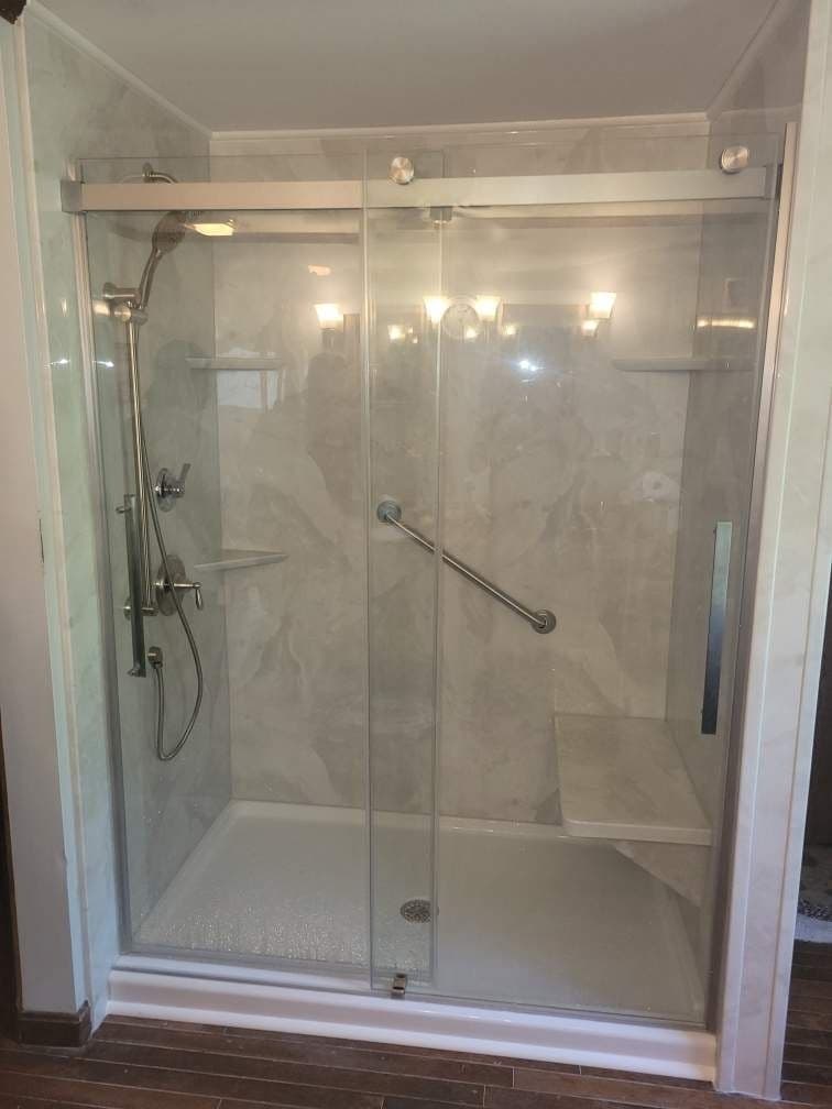 Before and after photos of a bathroom remodel.