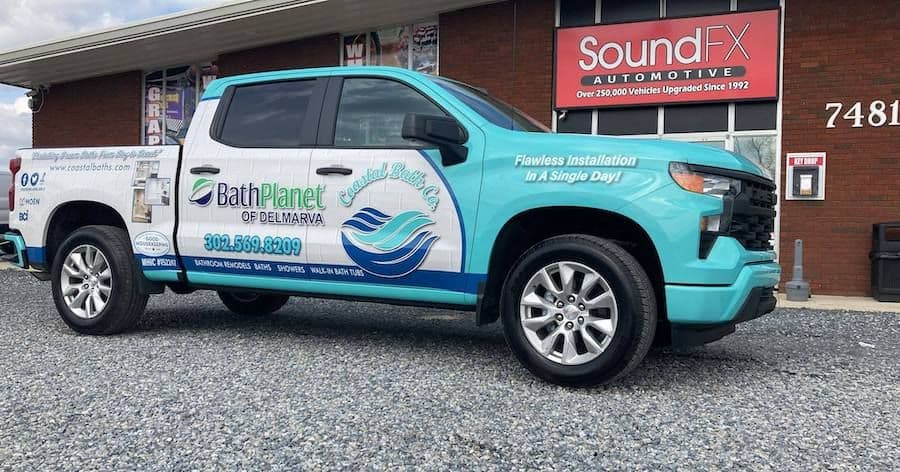 A Coastal Bath Company truck.