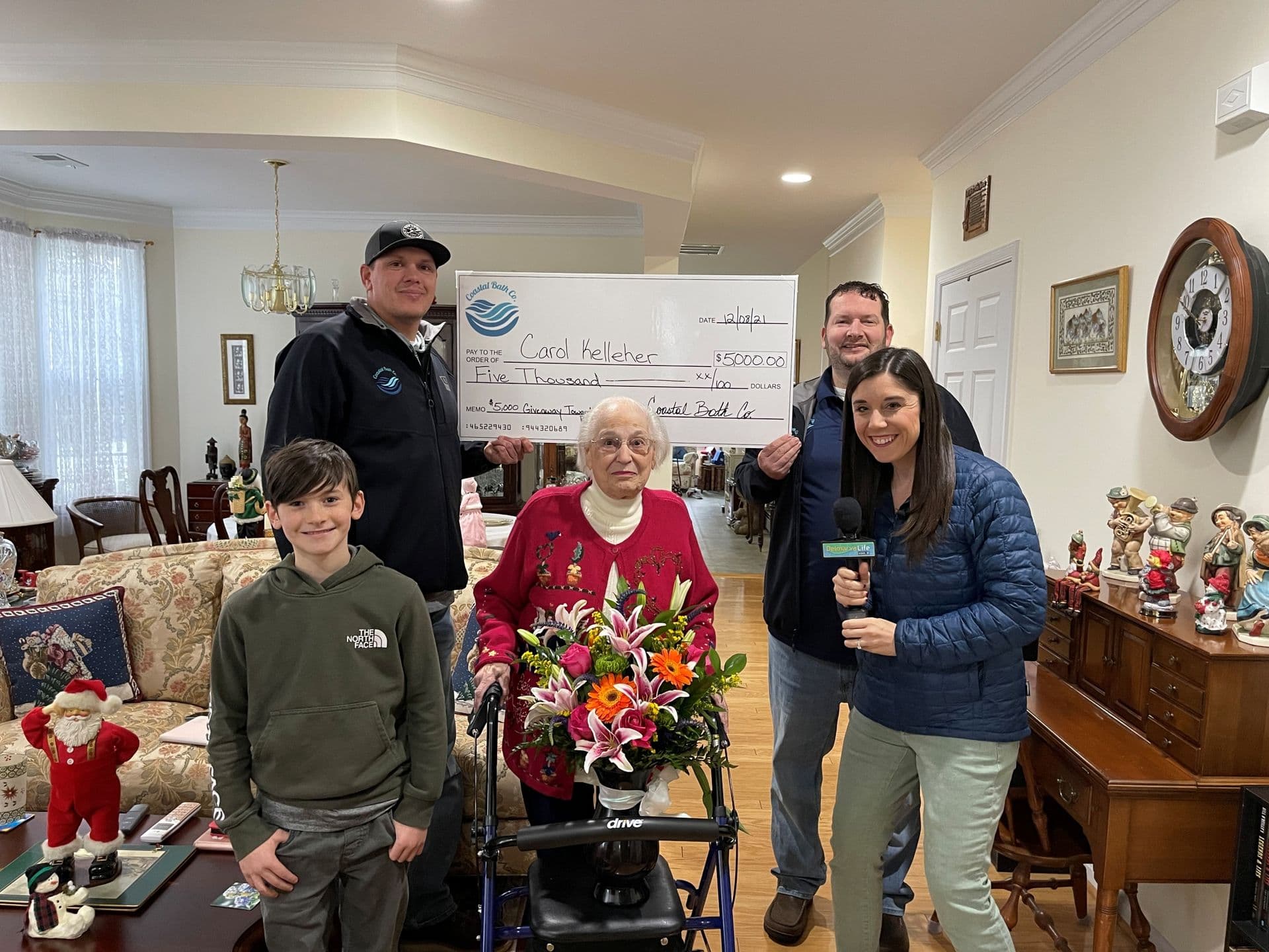 Winner of the $5,000 bath or shower giveaway.