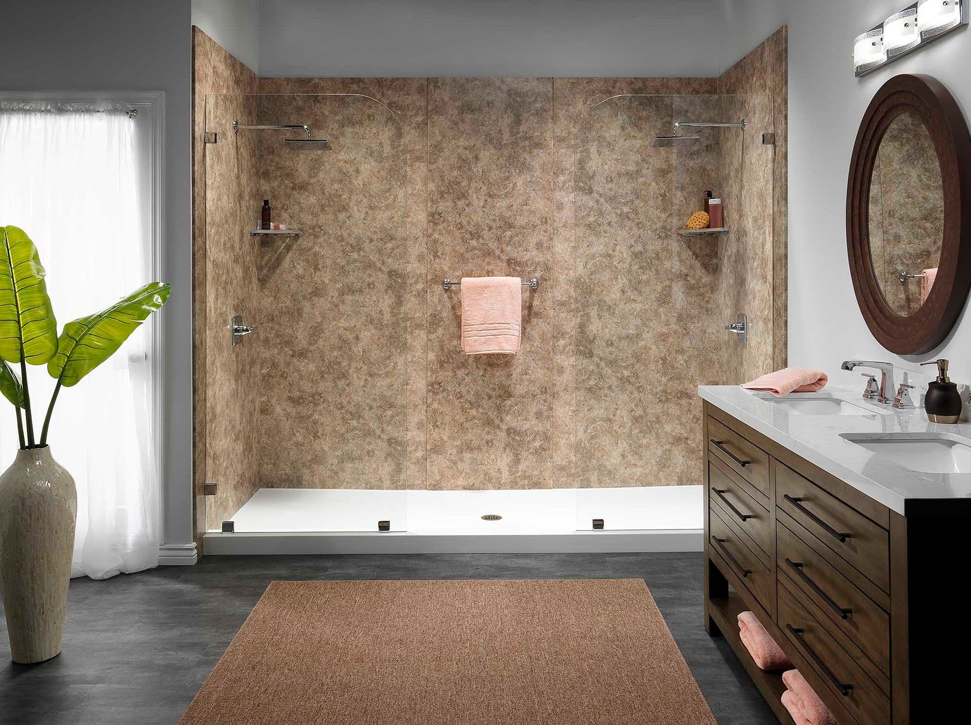 A double walk-in shower with rainfall shower heads, glass partitions, and brown textured pattern walls.