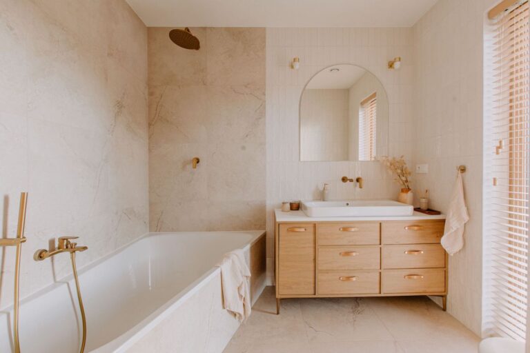Bathroom updated to have a relaxing color scheme.